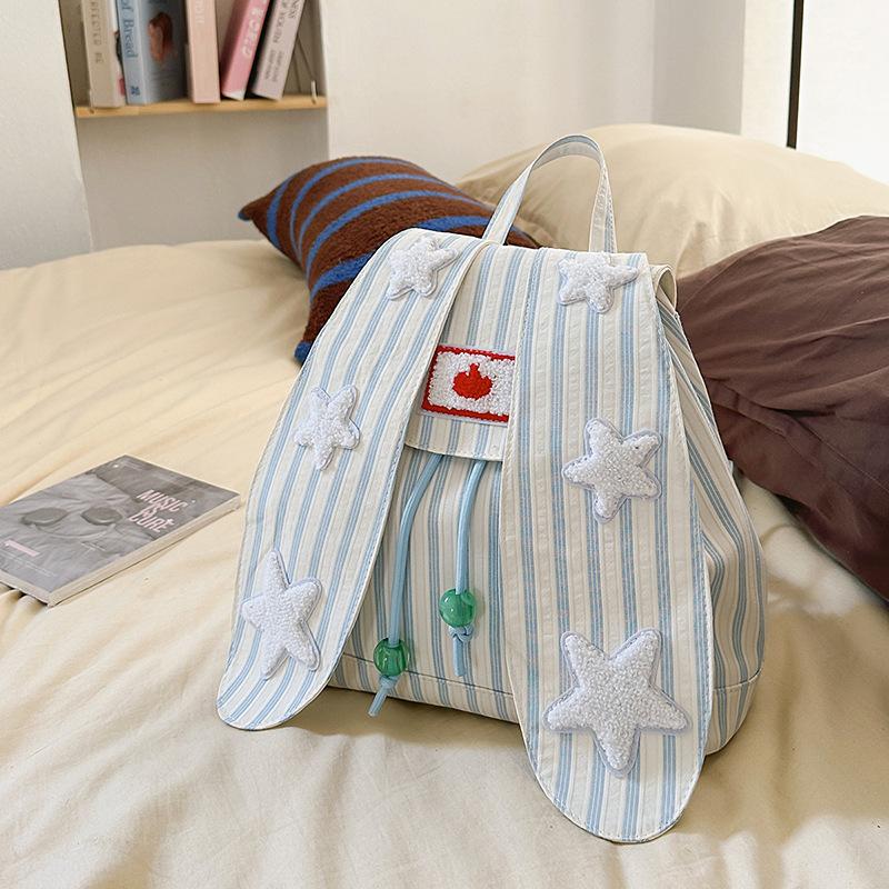 Cute rabbit ear backpack female junior high school student vertical stripe contrasting color star bag high value student travel small backpack