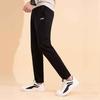 Li Ning Plain Logo Elastic Waist Straight Leg Sports Pants Men Bottoms Black AKLRB63-1