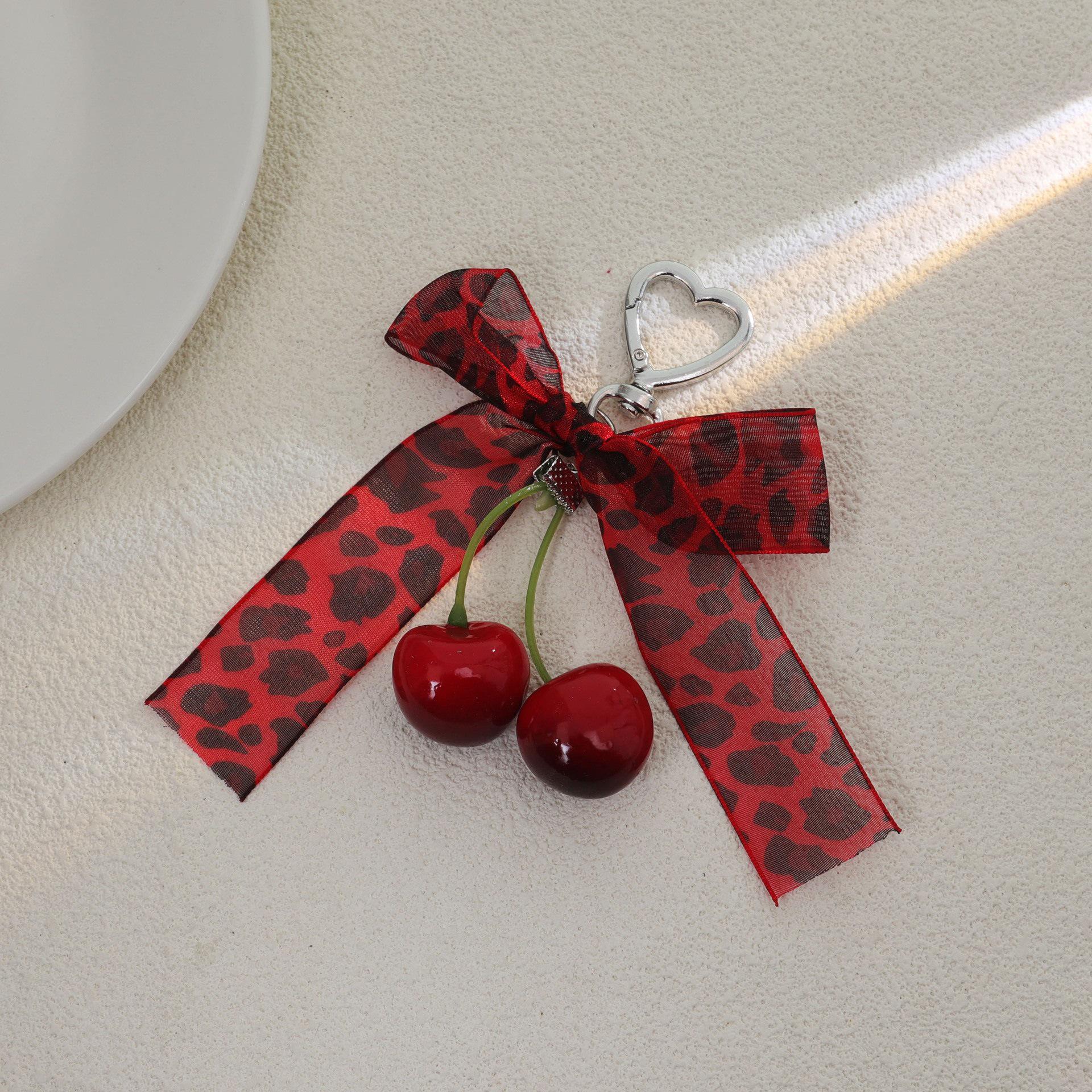 Korean Lace Bow Keyring with Heart, Cherry, and Leopard Plush Pendant Ornament.