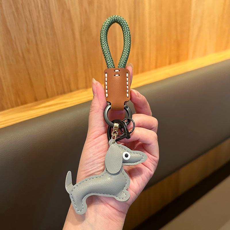 

Dachshund Leather Rope Keychain, High-End Fashion Keychain Pendant, Genuine Leather Puppy Exquisite Bag Pendant. no specifications