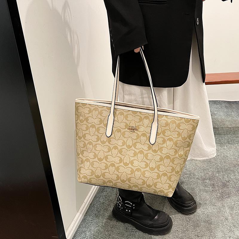Bolso de gran capacidad para mujer 2026 nuevo bolso de hombro de moda sensación casual bolso tote para el trabajo y el transporte diario