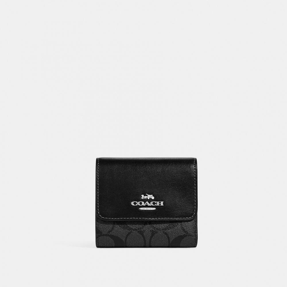 

Маленький кошелек тройного сложения Coach из канвы Blocked Signature