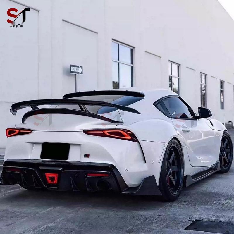Compatible with Toyota Supra A90/A91 Carbon Fiber AG Style Body Kit: Front Lip, Rear Lip, Side Skirts, Tail Wing.