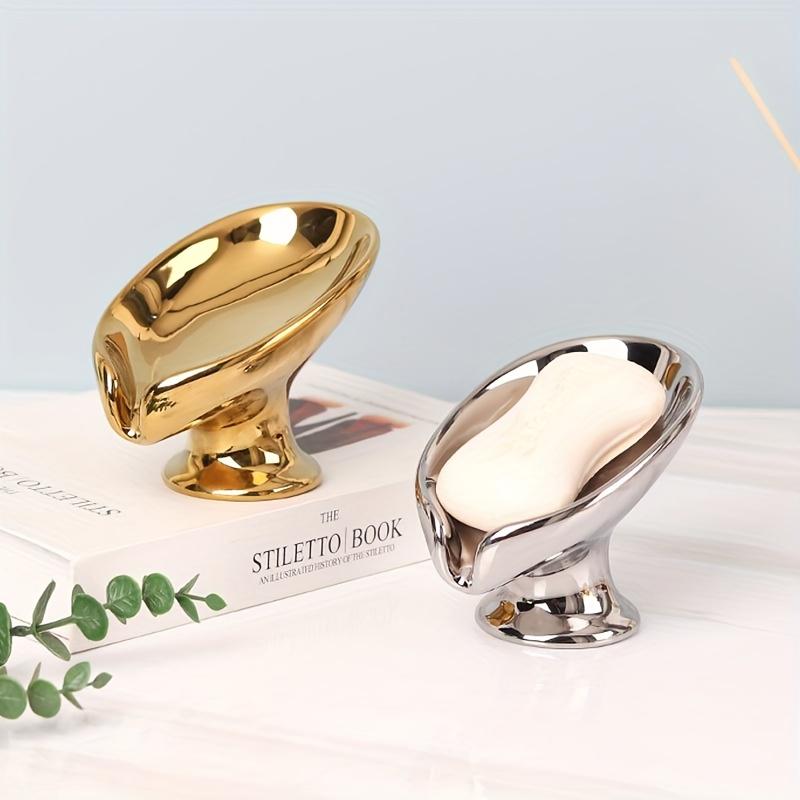Suport Elegant pentru Săpun din Ceramică cu Frunze Aurii și Argintii, Design Oval cu Scurgere Automată pentru Organizarea Băii, Suport de Depozitare în Formă de Frunză cu Suprafață Texturată