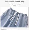Męskie Jeansy Plus Size Jasnoniebieskie z Elastycznym Pasem - Luźne, Szerokie Nogawki, Sznurek, Długie do Ziemi, Codzienne i Wszechstronne.