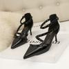 Simple stiletto high heels, shallow mouth pointed rivets, hollowed-out one-word sandals