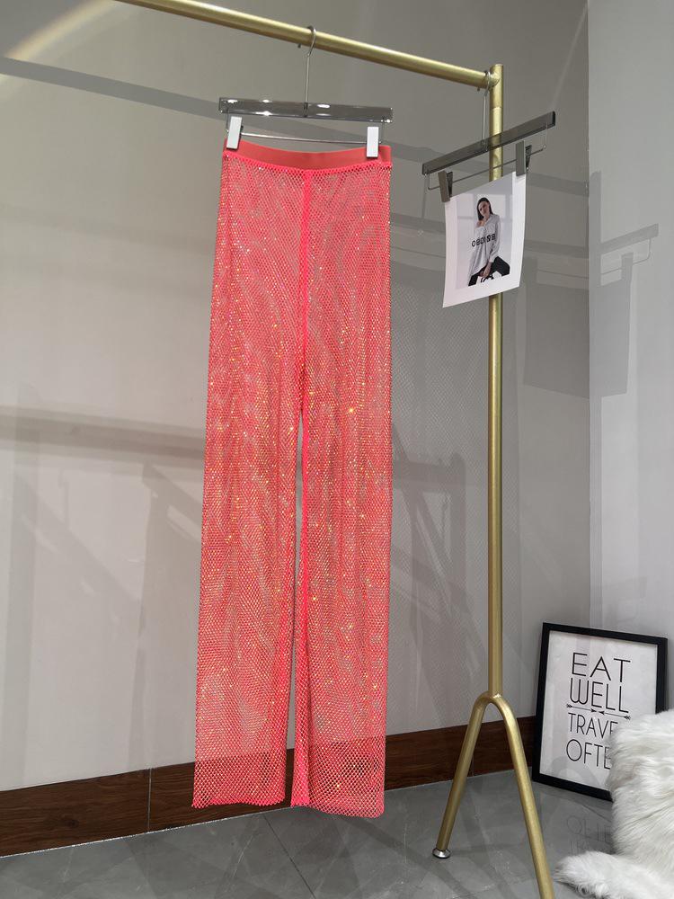 Letní sexy síťované kalhoty s výřezy a kamínky se širokými nohavicemi do nočního klubu