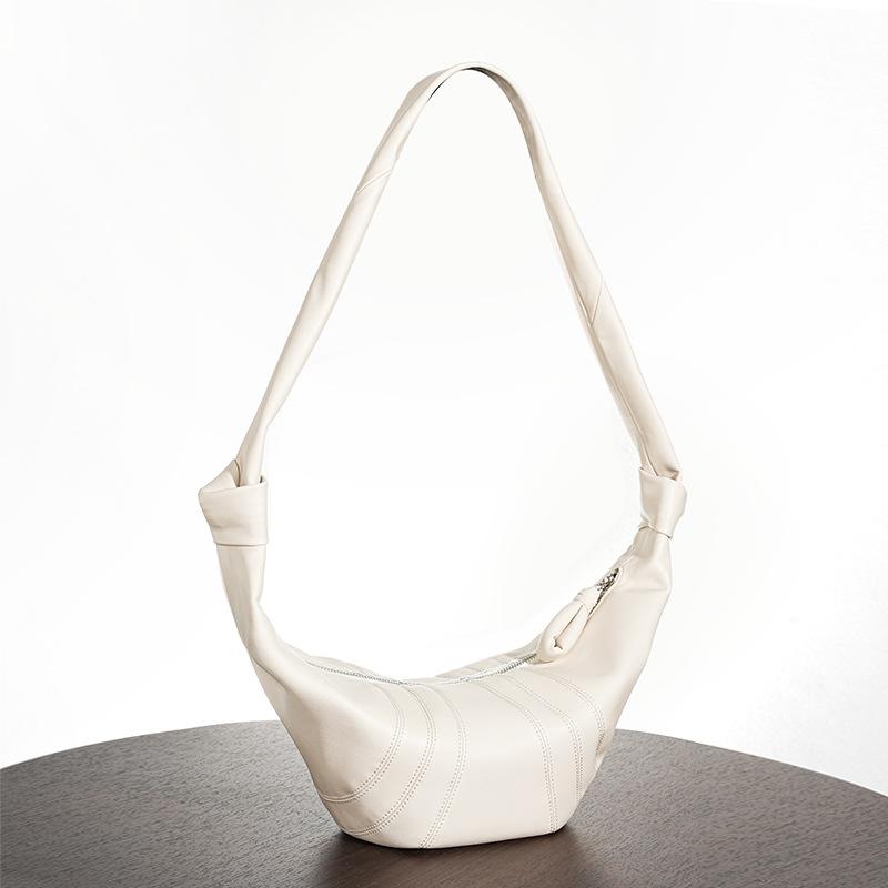 

Женская сумка новая нишевая из коровьей кожи сумка-круассан-пельмень, кожаная сумка-круассан большого объема женская сумка-круассан