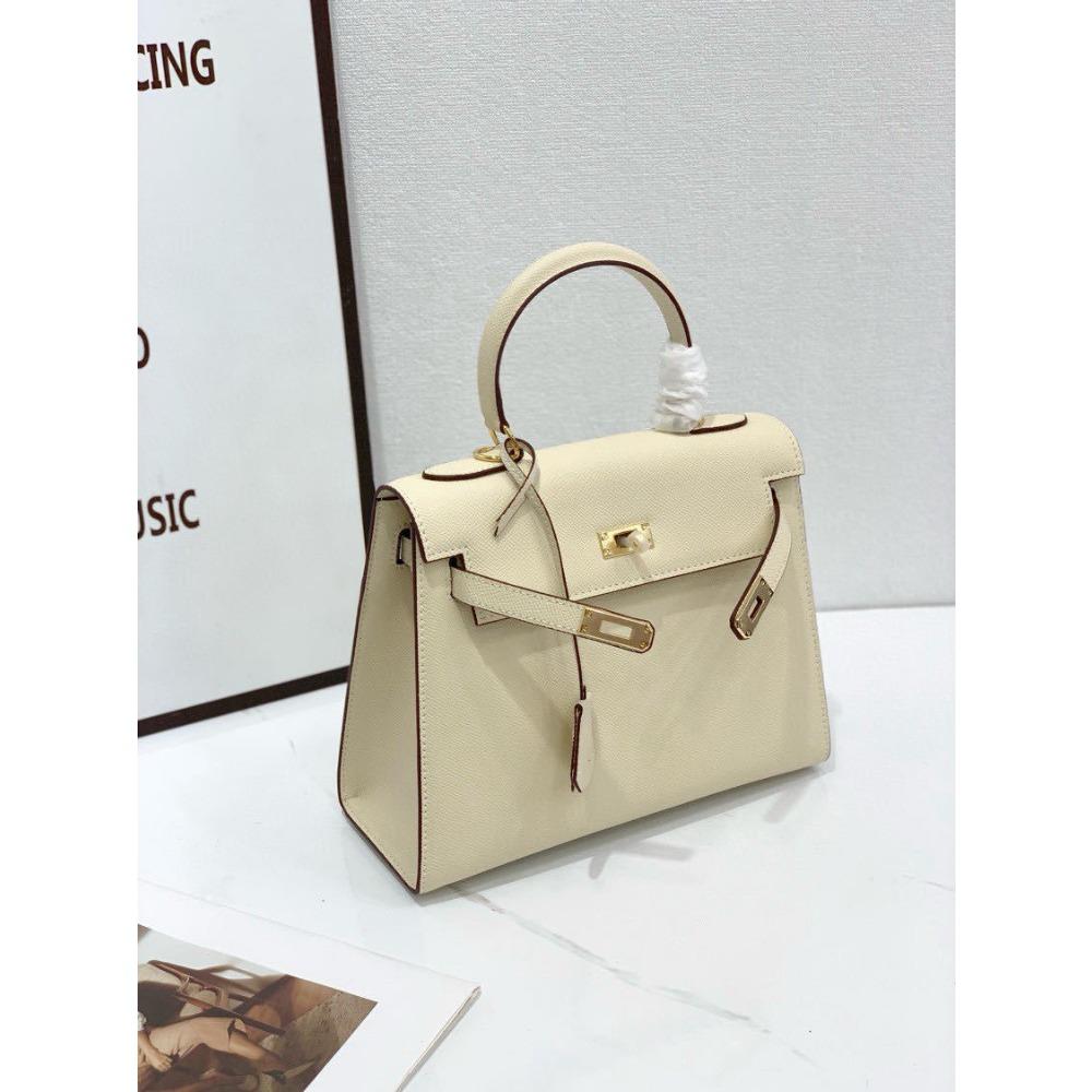 2024 nieuwe verticale tas palmdruk TOGO koeienhuid schoudertas handtas grote capaciteit dames tas leer lichte luxe leer