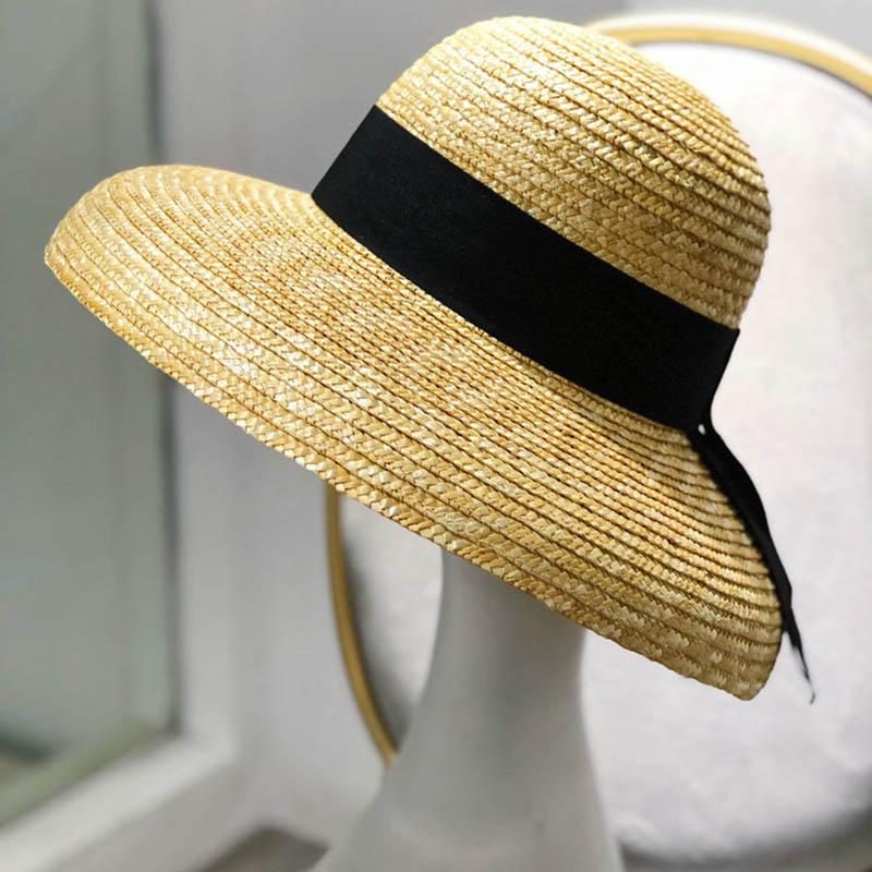 Breitkrempiger Damen-Sonnenhut Weizenstroh Sommer-Strandhut Elegante Kappe UV-Schutz Schwarze lange Band-Schleife Derby Reisehüte