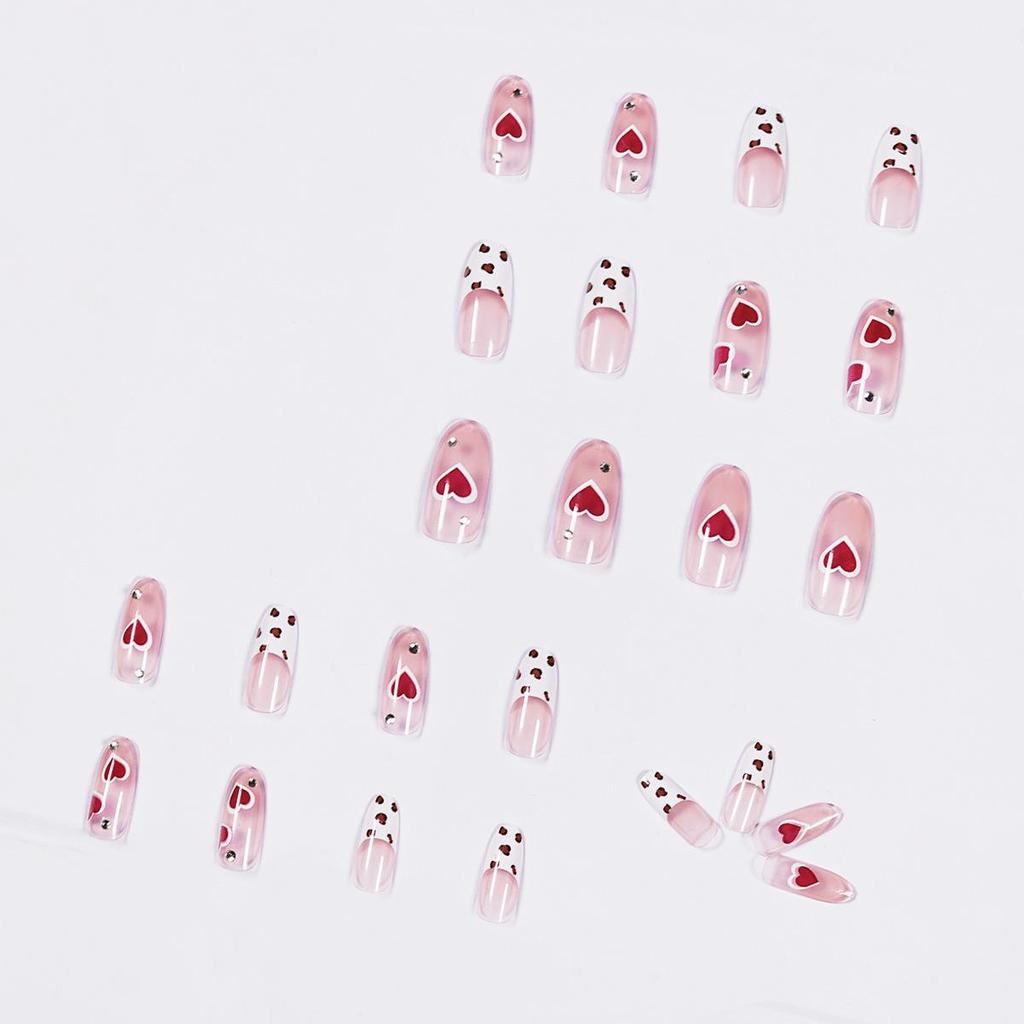 Ice-Transparent Nude Cow Print Love Heart False Nails - Waterproof, Removable, and Ready-to-Wear Nail Art Stickers.