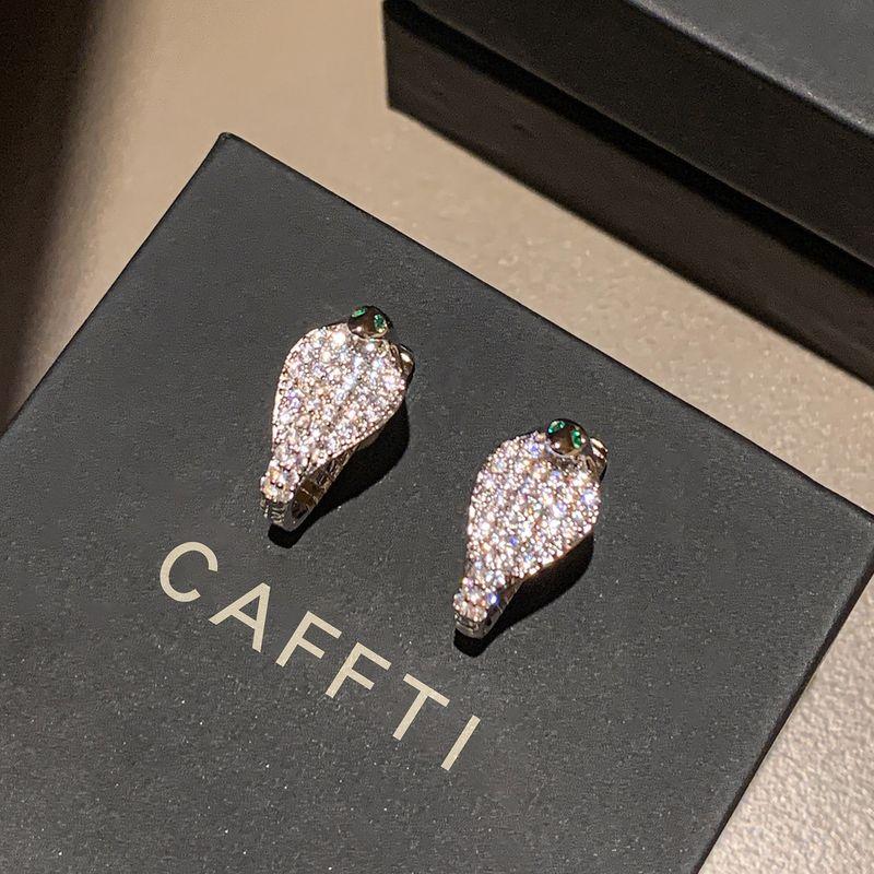 

and American Style Full Diamond Earrings with a Unique Design, Snake Earrings for Men, 2026 New Popular Style, High-End Green Earrings for Women Earrings