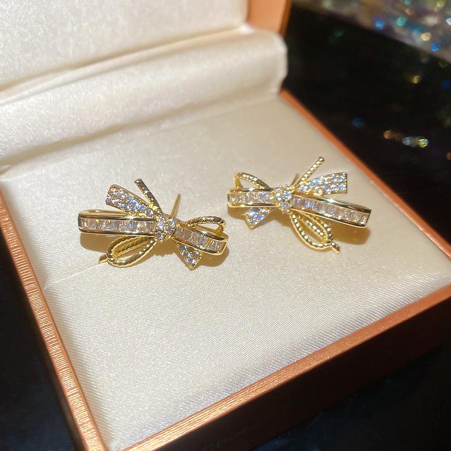 

Electroplated bow stud earrings elegant light luxury earrings personality temperament earrings