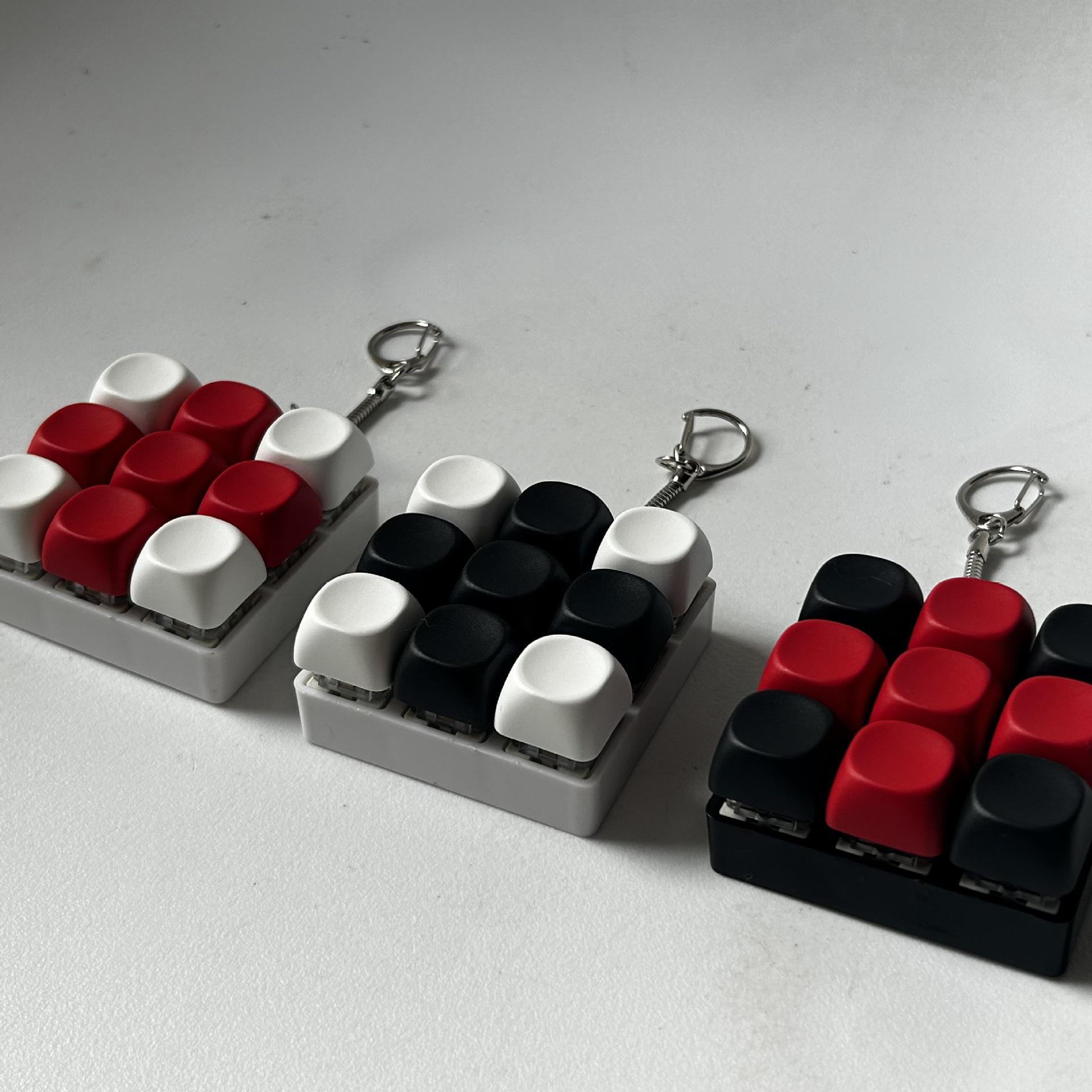 

Office Stress Relief 9-Key Light-Up Keychain Toy