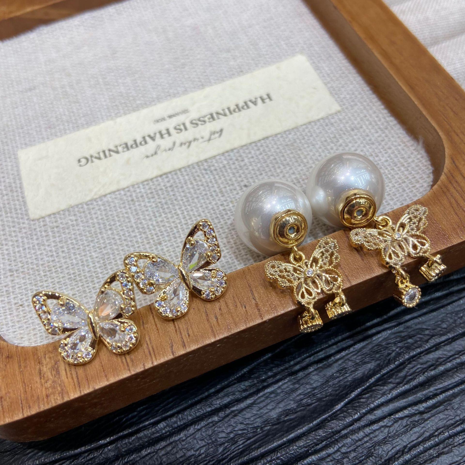 

Copper Plated Thick Silver Super Fairy Inlaid Zircon Butterfly Tassel Two Wearing Earrings Female Sweet Temperament Stud Earrings