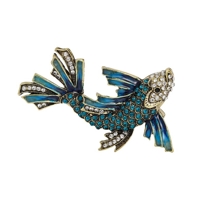 

Винтажная брошь в виде рыбы со стразами для женщин, унисекс, плывущая рыба, животное, вечеринка, повседневная корсажная булавка, подарки