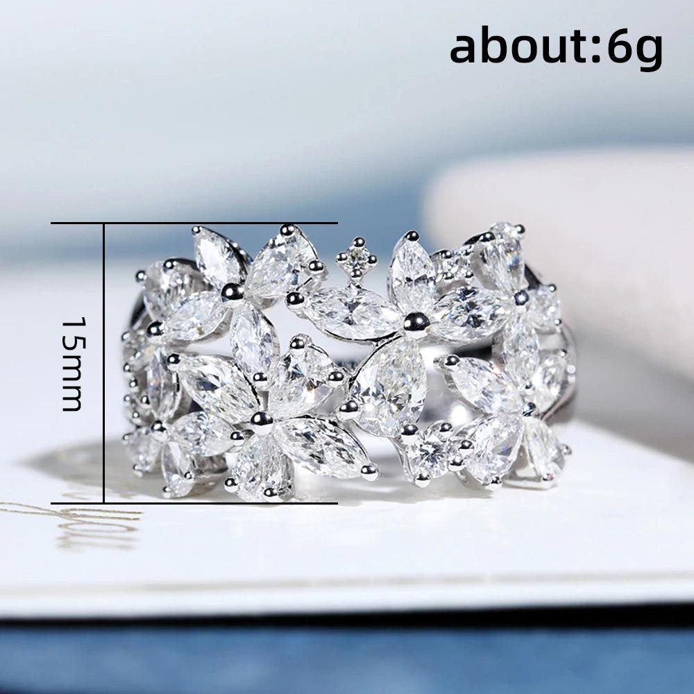 Cao Shi Brillanter Pavé Blütenblattring für Damen: Luxus-Hochzeitschmuck-Trend