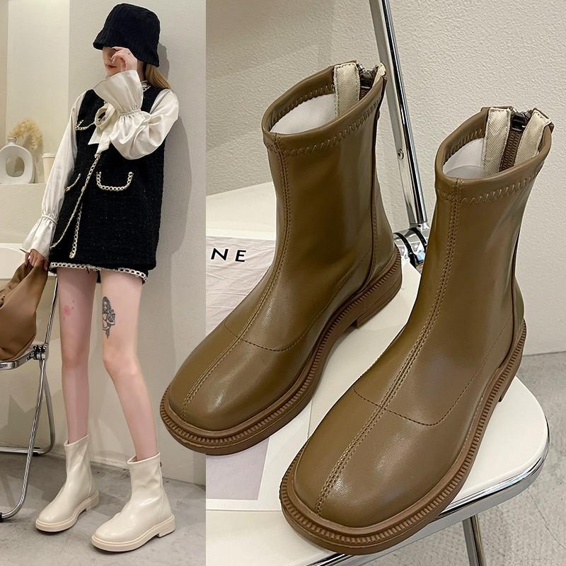 Martin boots spring and autumn new flat bottom round head thin boots with skirt short boots women