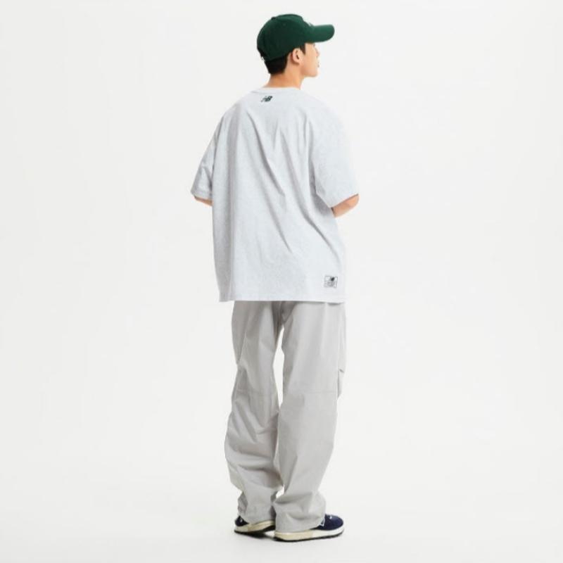 New Balance Tee Kqj Nbnee22533 16 Common Nbsc Short Sleeve Tee Semi Ove