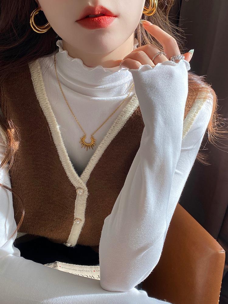 

Женский топ облегающего кроя с полувысоким воротником и деревянной отделкой ушек, осенне-зимняя коллекция 2024 года Medium