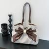 Frühling neue Retro-Pünktchen-Großraum-Tragetasche Schleife Spitze Vielseitig für Pendler Unterarm-Schultertasche