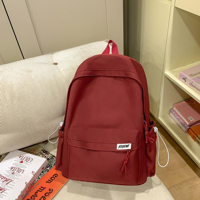 Simple casual large-capacity backpack women's new junior high school high school student schoolbag versatile travel backpack