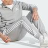 Adidas Essentials Fleece 3-Stripes Kalhoty se zúženými manžetami Středně šedý melír Pánské Streetwear IJ6494