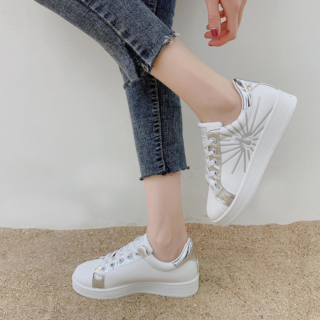 white flat sole trainers