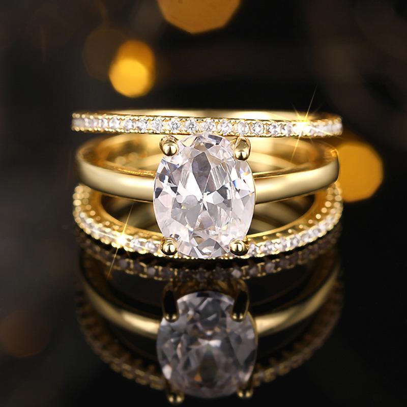 Cao Shi Luxury Four-Prong Oval Zirconia Wedding Ring Set - Three-Piece Design for Women