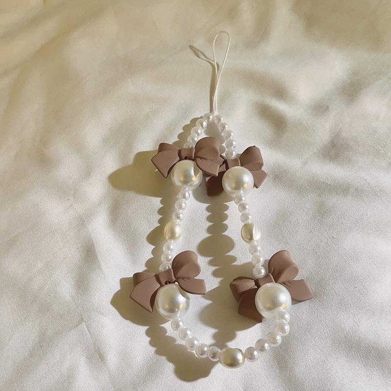Bracelet de perles d'amour pour femmes, petit nœud en cristal frais, fleurs, amour, chaîne de téléphone portable, anti-chute, accessoires de coque de téléphone portable, DIY