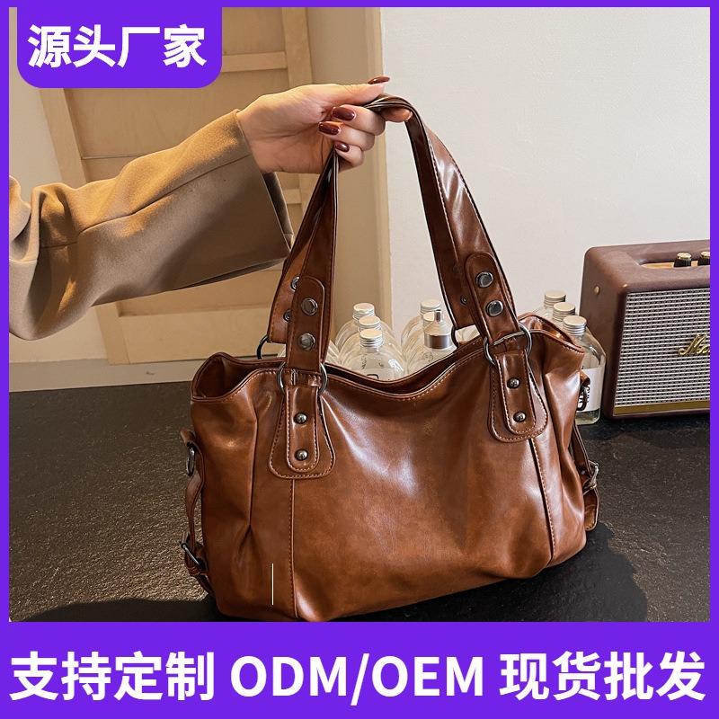 Retro solid color large-capacity tote bag commuter women's bag is available in batches
