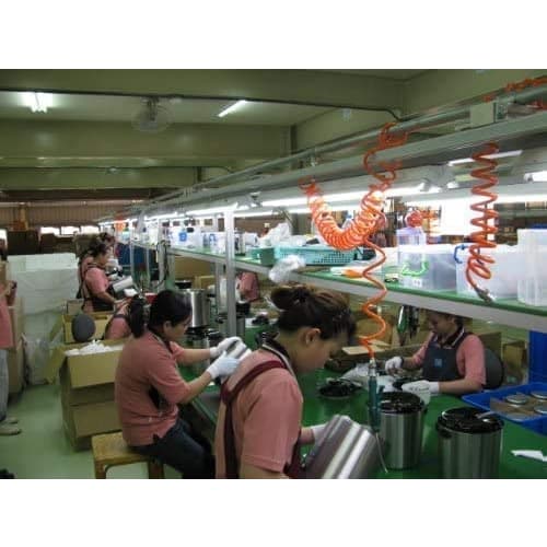 Pure Pot, a Magnetic Power Cord-operated Water Distiller Manufactured by Taiwan's MegaHome, Features a White Stainless Steel Body, a New Glass Contain