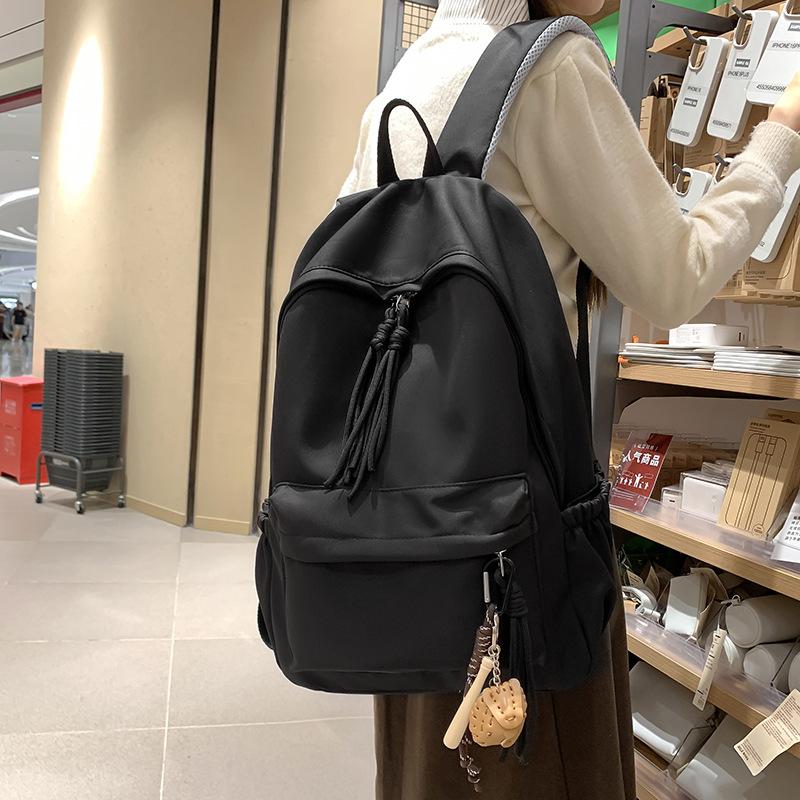 New schoolbag female college students simple large capacity junior high school students high school students backpack backpack design sense male