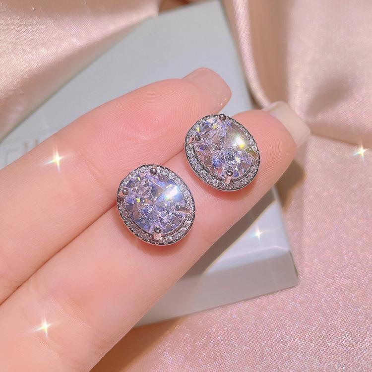 

Интернет-знаменитость Прямая трансляция Комплект из трех предметов Овальный циркон Роскошное кольцо Ожерелье Подвеска Серьги Свадебный набор