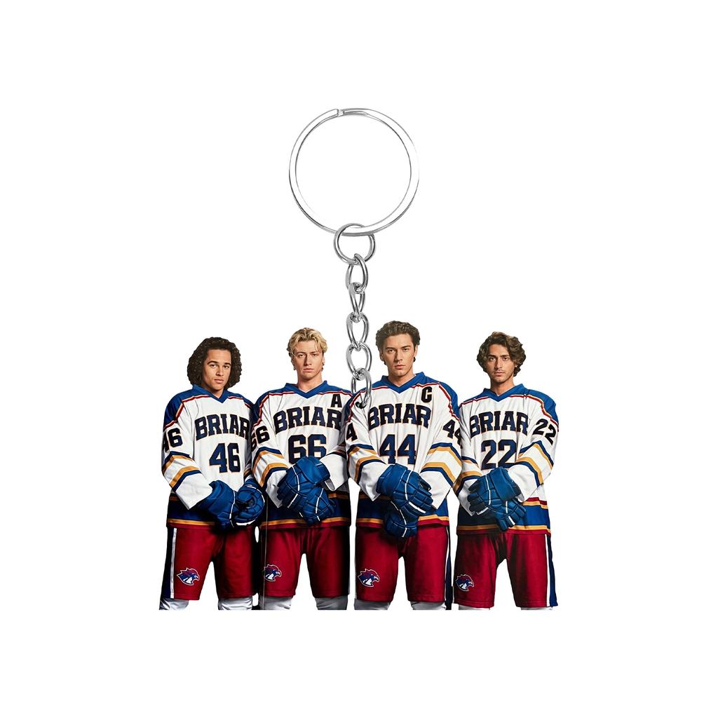 Acrylic Keychain Featuring Four Ice Hockey Players Standing Side by Side Wearing Numbered Jerseys with Attached Metal Key Ring for Easy Carrying