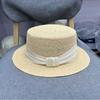 High-end fine needle light luxury imported raffia flat top simple straw hat women's summer sunscreen vacation sunshade small brim top hat