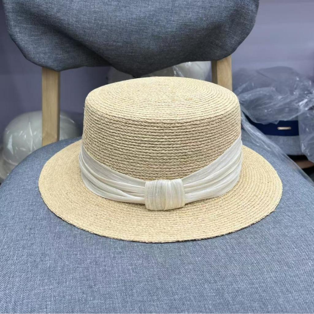 High-end fine needle light luxury imported raffia flat top simple straw hat women's summer sunscreen vacation sunshade small brim top hat