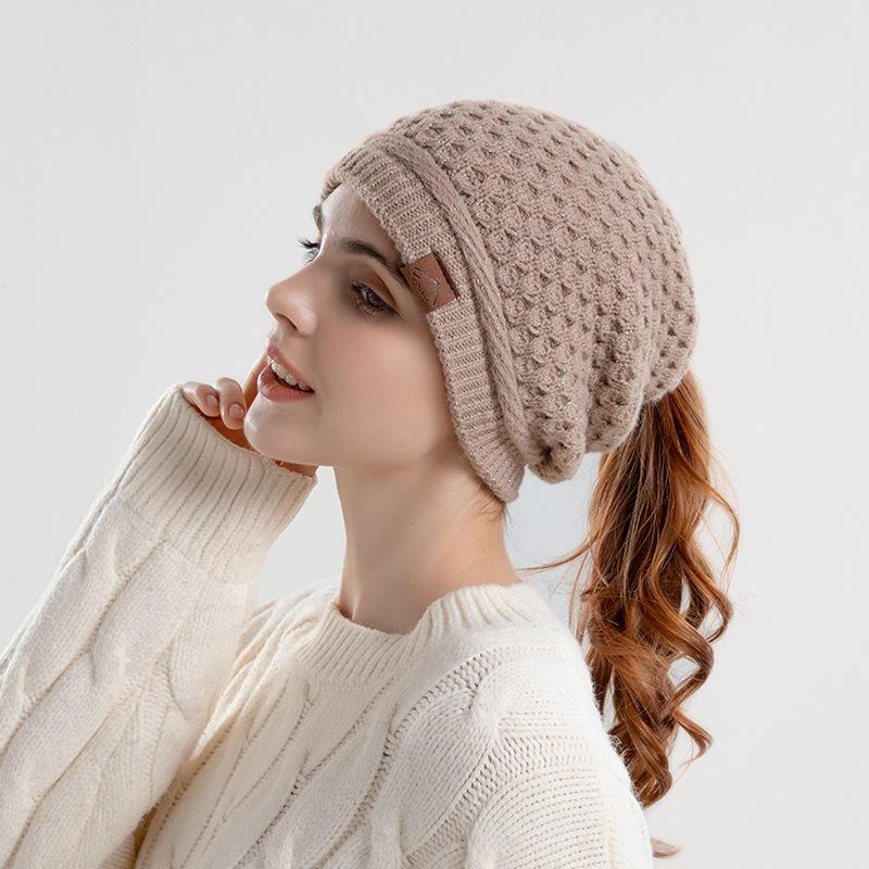 Autumn and Winter Warm Ear Protection Pullover Hat Women's Hat Ponytail Hole Knitted Hat European and American Wool Hat Tide