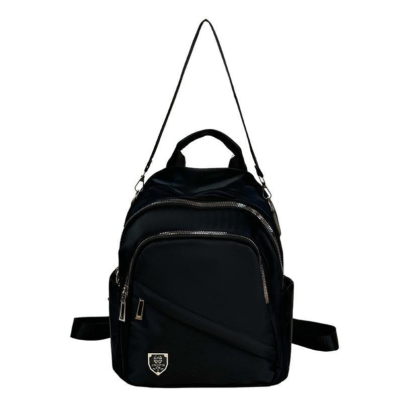 Schoolbag Simple temperament Casual backpack Multi-pocket large capacity Lightweight backpack Fashion versatile shoulder messenger bag