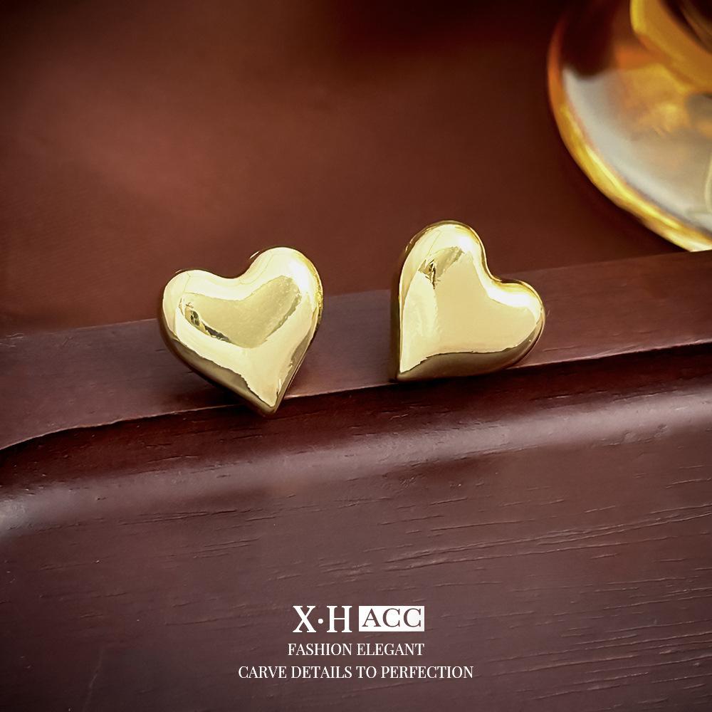 

Темпераментные серьги-кольца с золотым пигментом, нишевый дизайн, серьги-пряжки для ушей, легкая роскошь, ретро, высококлассные серьги