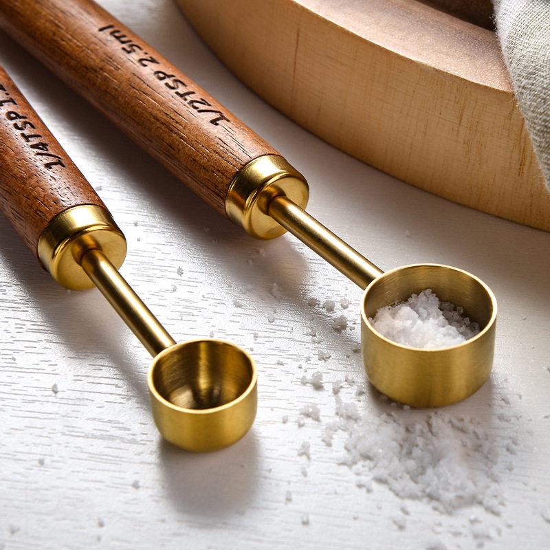 8-Piece Rose Gold Stainless Steel Measuring Spoon & Cup Set with Acacia Wood Handles