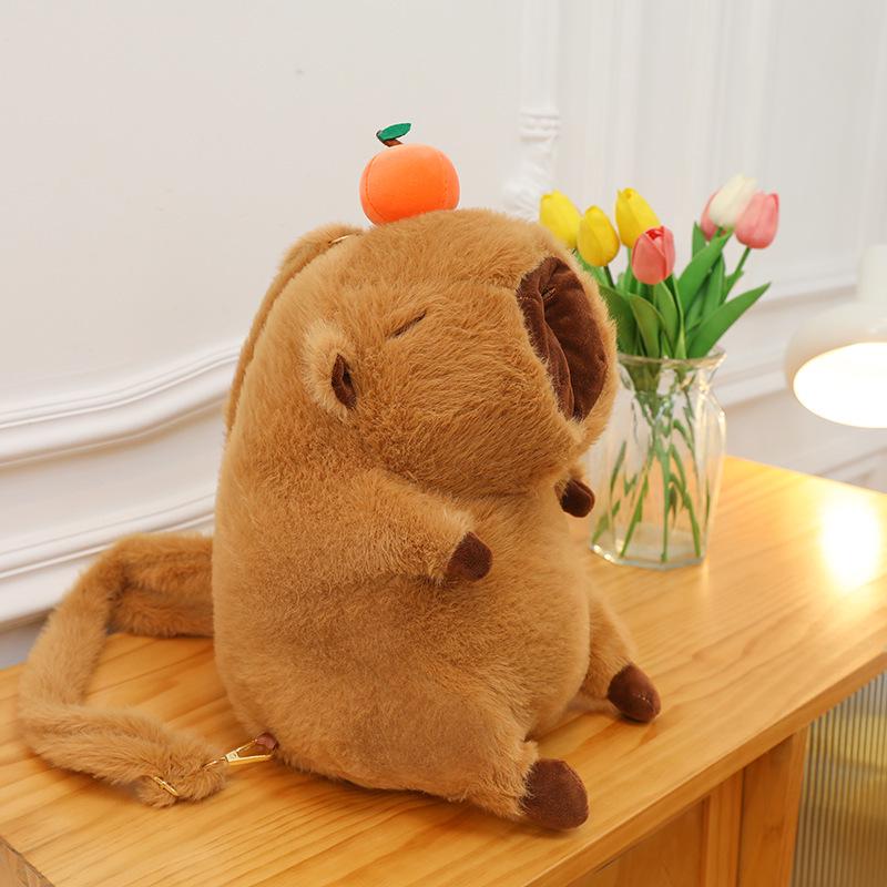 

Рюкзак и плюшевая игрушка Капибара оранжевого цвета 35 cm