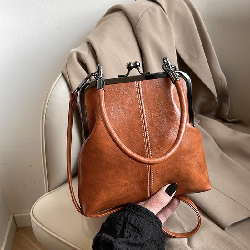 

Элегантная наплечная сумка с застежкой-клипсой, большая вместимость, из искусственной кожи, сумка кроссбоди, однотонная, ретро, женская маленькая сумочка 19x5x20cm коричневый/жёлтый