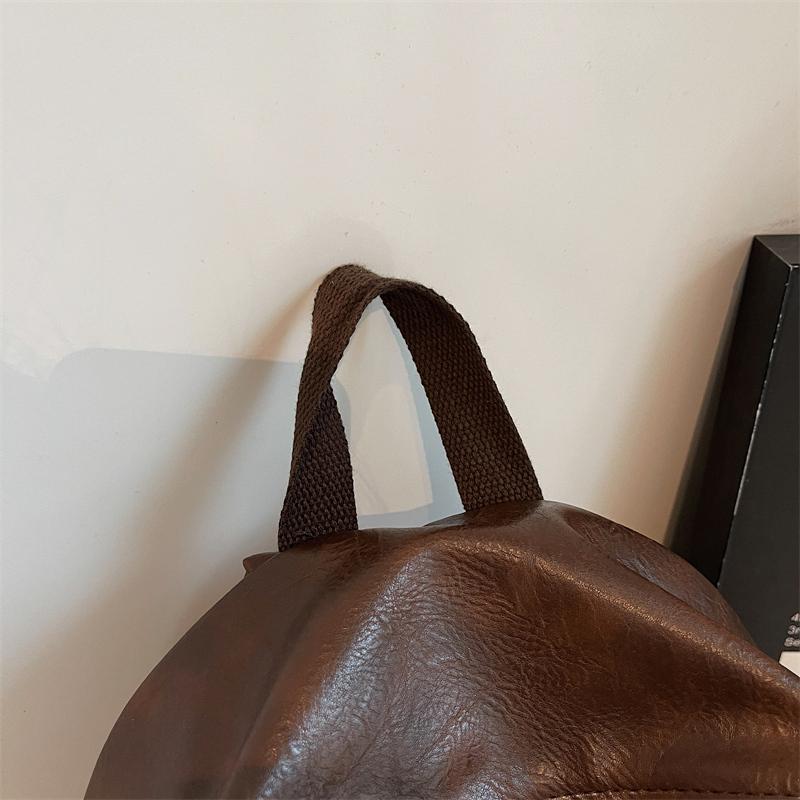 Fashionable PU Leather Backpack with Adjustable Shoulder Straps Simple Design Suitable for Daily Use Travel Shopping and Other Scenarios No Pendant