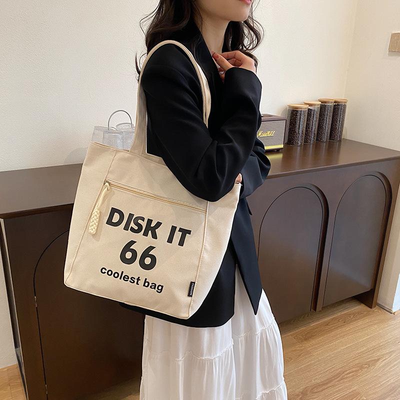 

Fashion large-capacity tote bag women s new textured hand-held canvas bag and shoulder bag чёрный