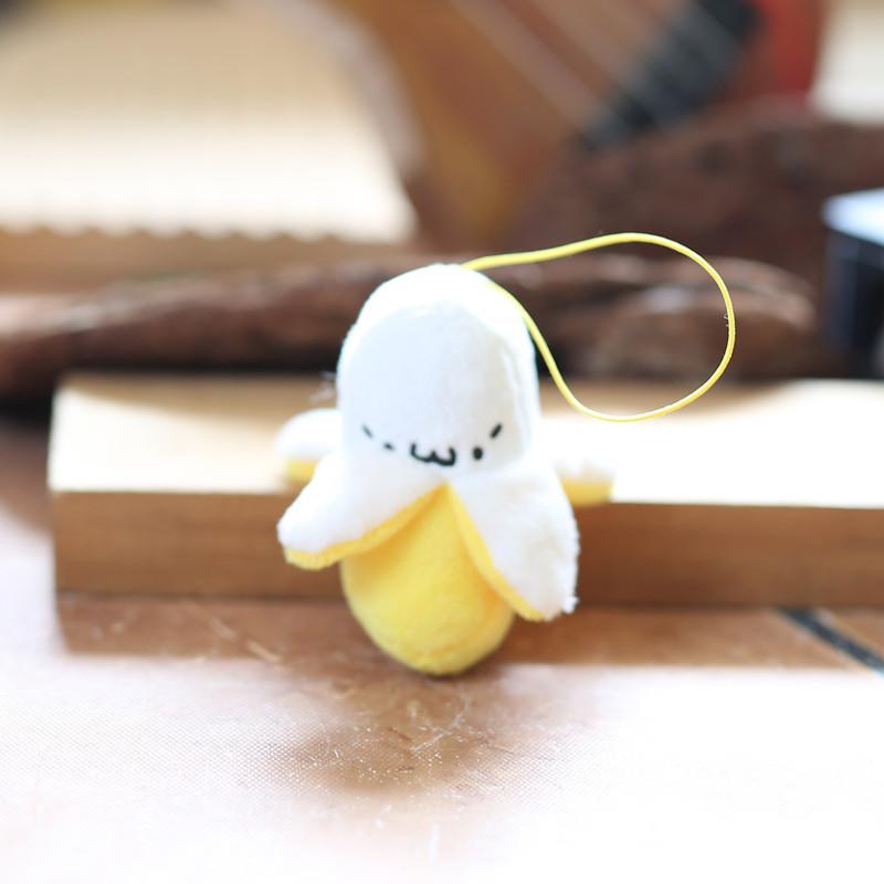 

Милая симпатичная кожаная маленькая банановая подвеска плюшевая игрушка кукла сумка подвесной брелок тряпичная кукла кукла кукла 8 cm