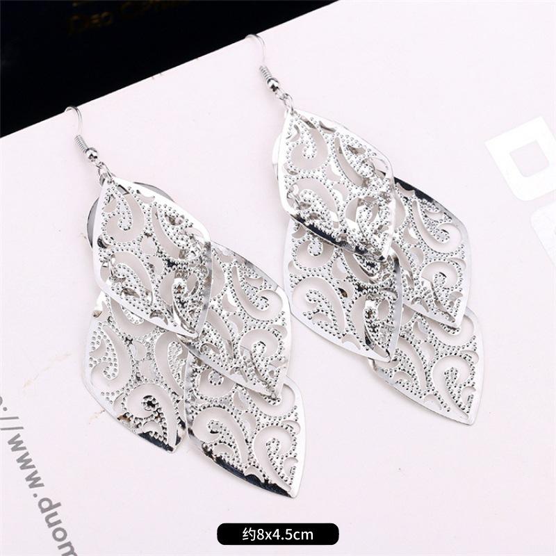 Fashion exaggerated niche temperament fringed earrings retro personality versatile sequined earrings women's long ear jewelry