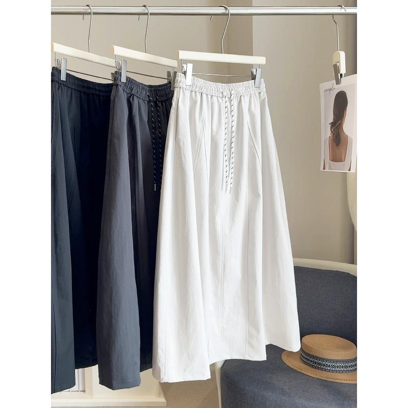 

Contrasting color drawstring tooling skirt women s new high waist covering hips and thin splicing A word medium and long pumpkin skirt one size абрикосовый