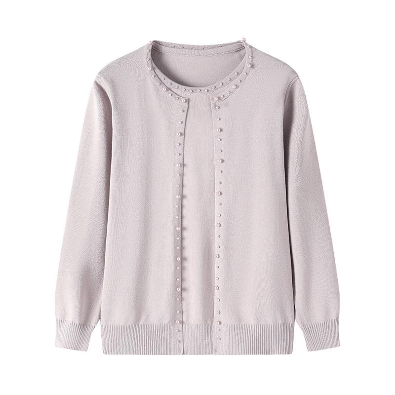 Completo due pezzi con giacca primaverile e maglia per donne 40-50 anni