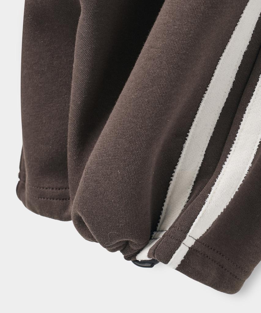 Dimiteulibeullaeg Vlad One-Pleat Curved Track Sweatpants_Brown